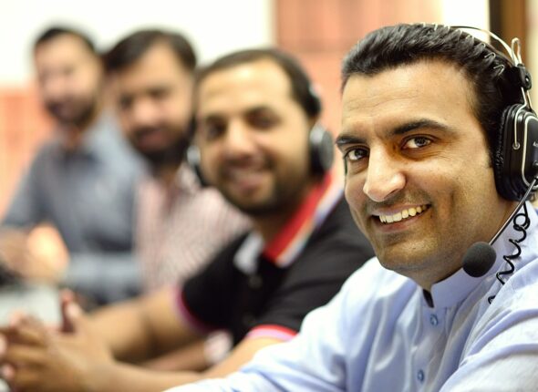 man in white button up shirt smiling